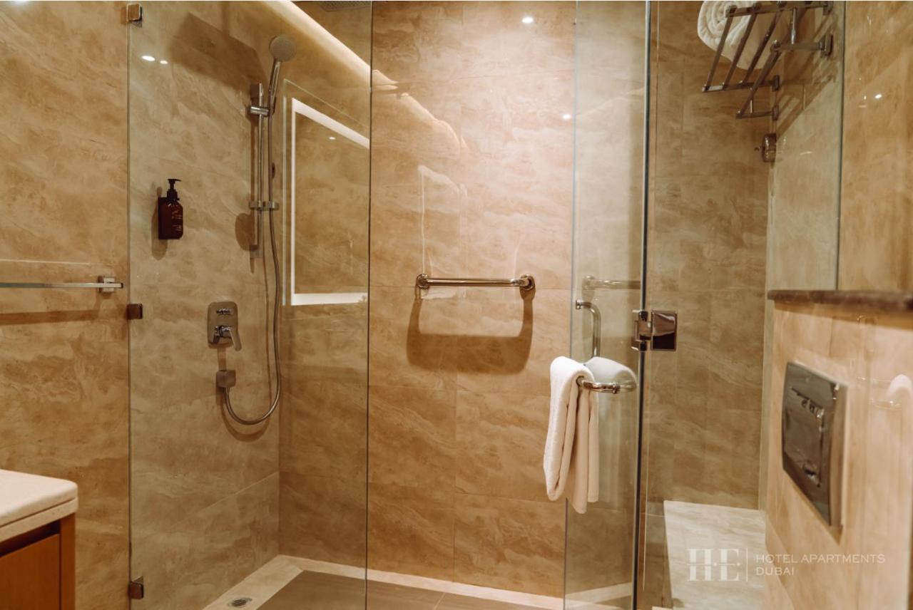 He Hotel Apartments 迪拜 客房 照片 A shower cubicle